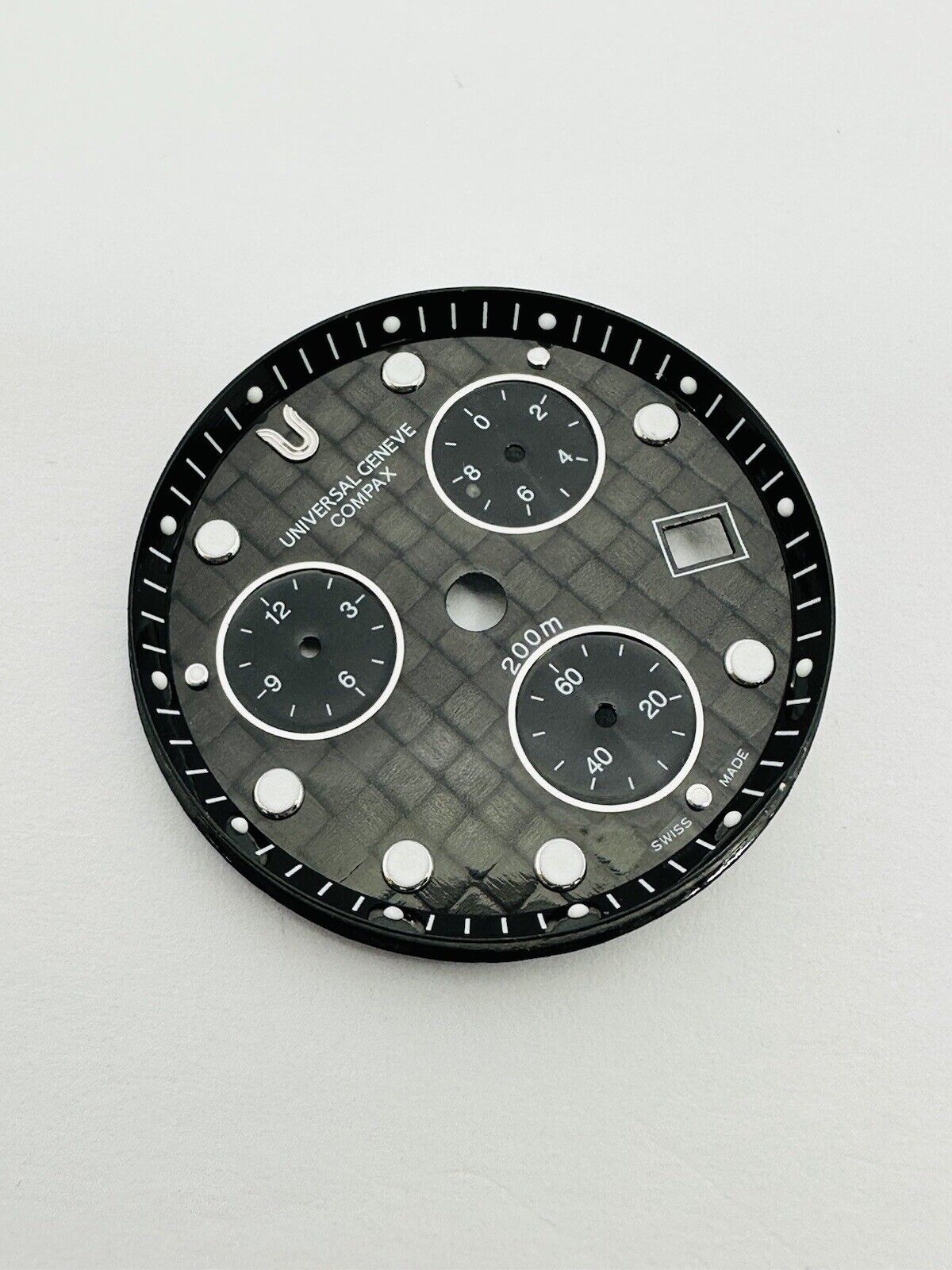 Universal Geneve Compax Quartz Chronograph 200m Carbon Fibre Dial Size 30mm.